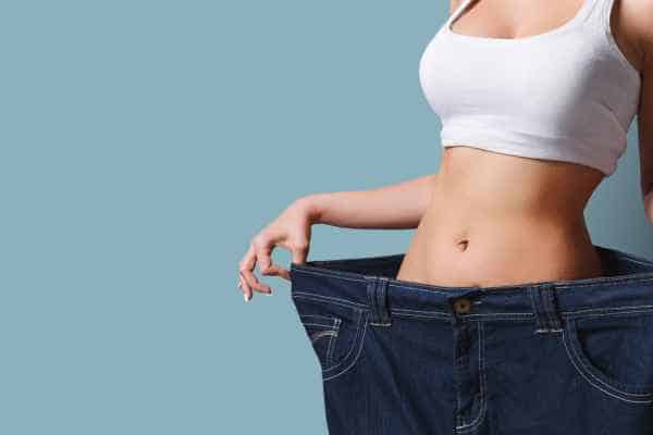 woman after fat reduction treatment Kilburn
