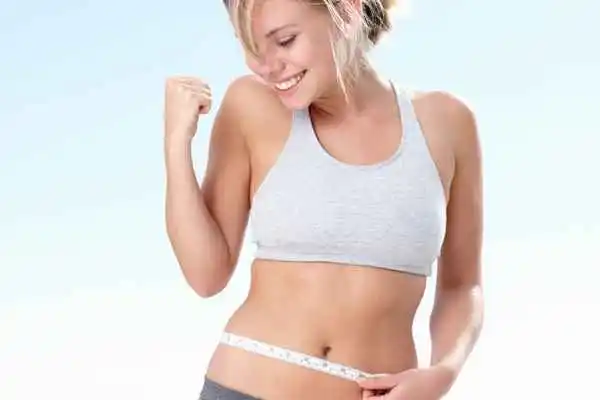 woman happy after fat reduction treatment Kilburn