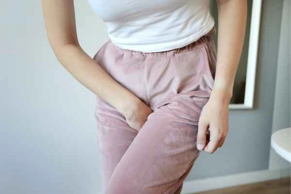 older woman running to the toilet because of urinary incontinence Kilburn